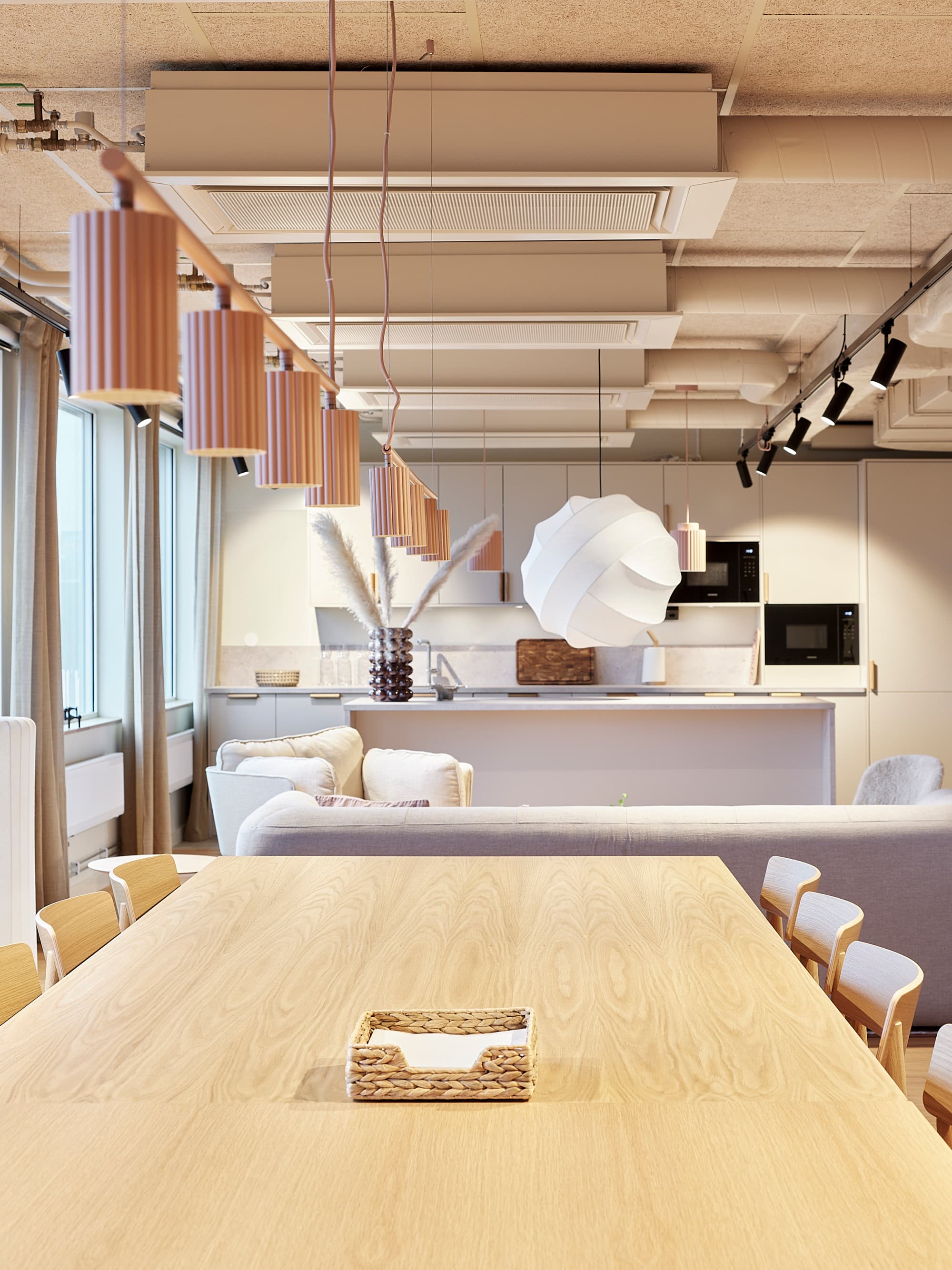 Ett stort träbord som sitter i ett vardagsrum bredvid ett fönster.