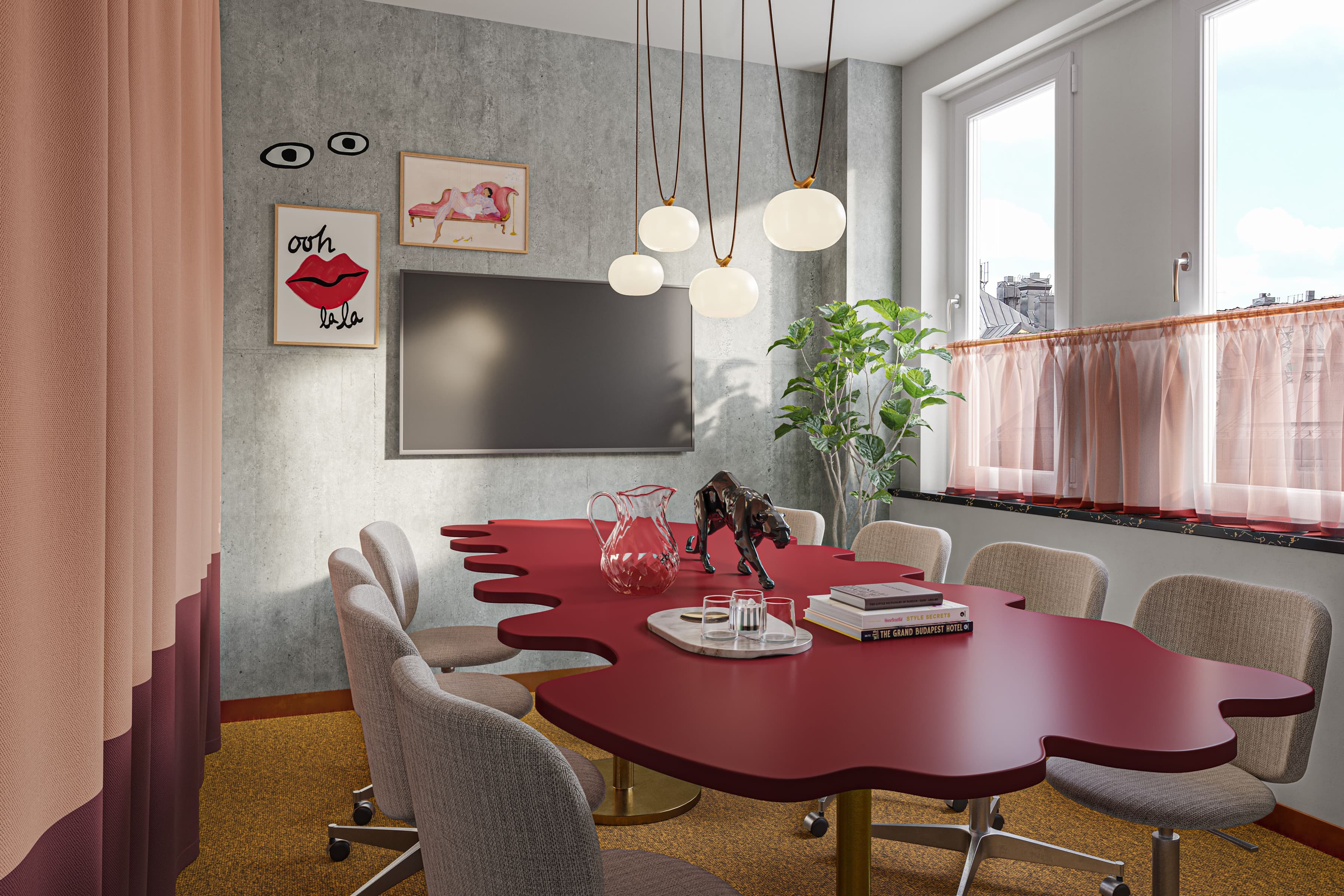 Ett konferensrum med ett rött bord och stolar. Konceptet kallas Boutique