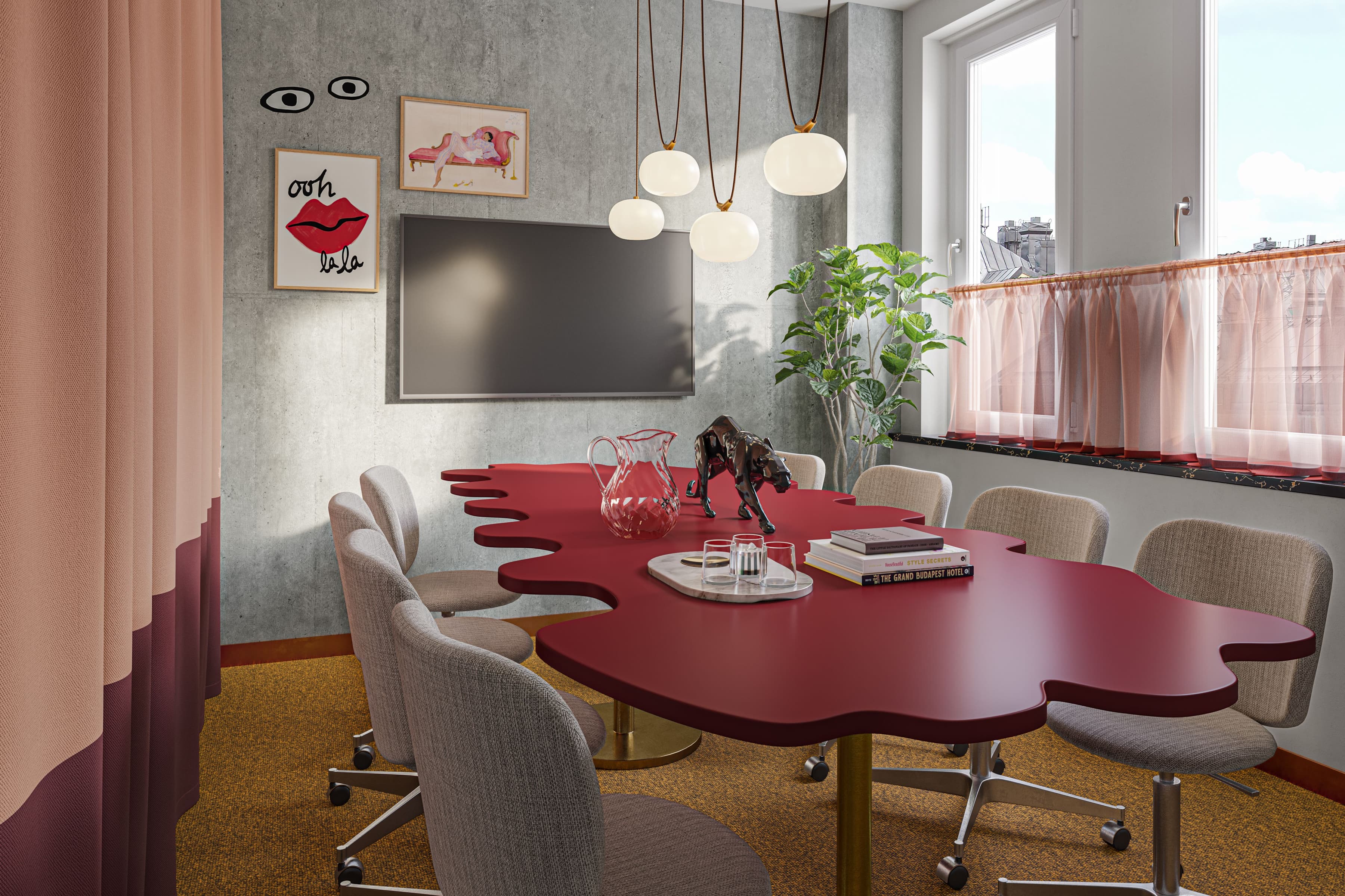 Ett konferensrum med ett rött bord och stolar.