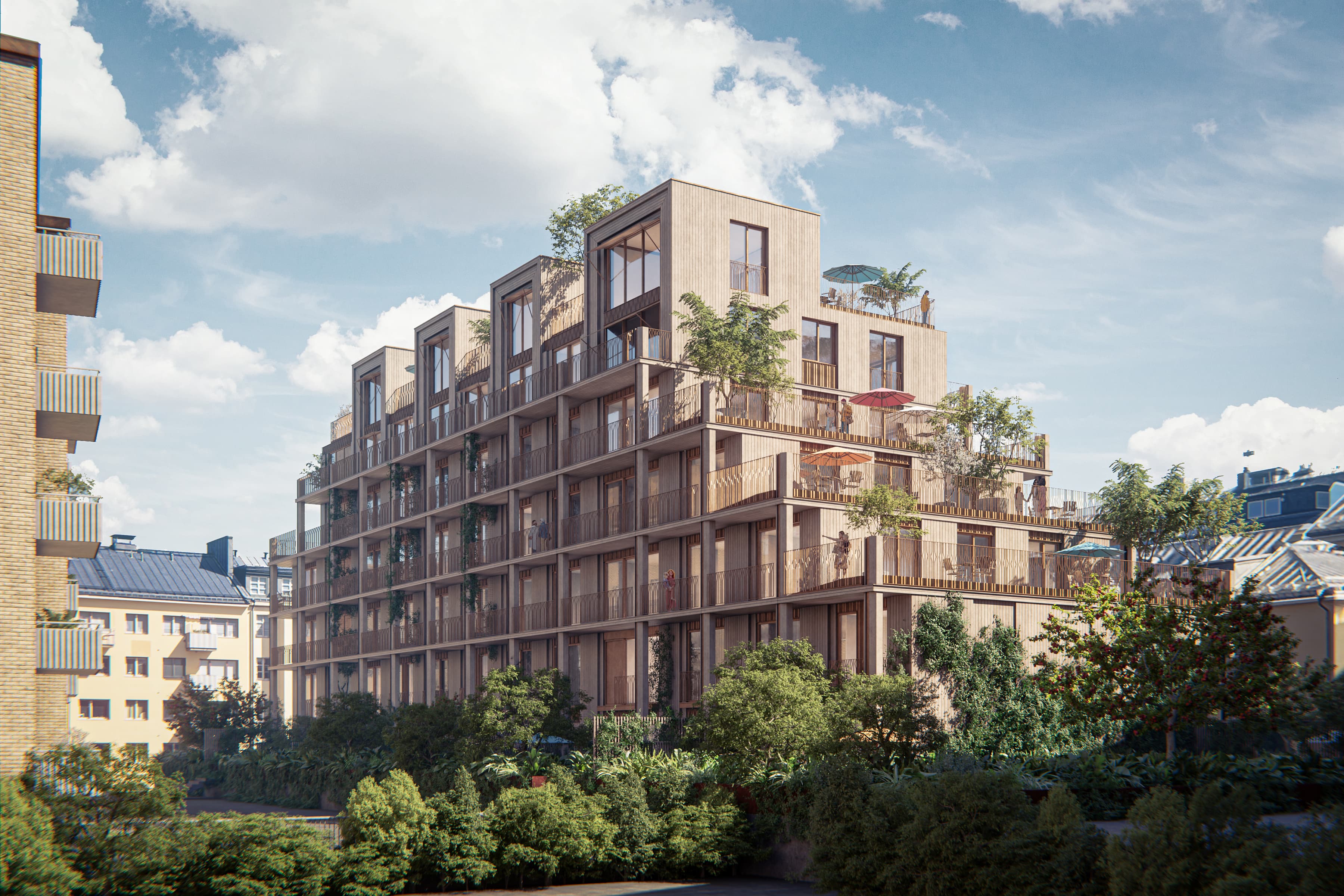 En grupp höga byggnader som ligger bredvid varandra.