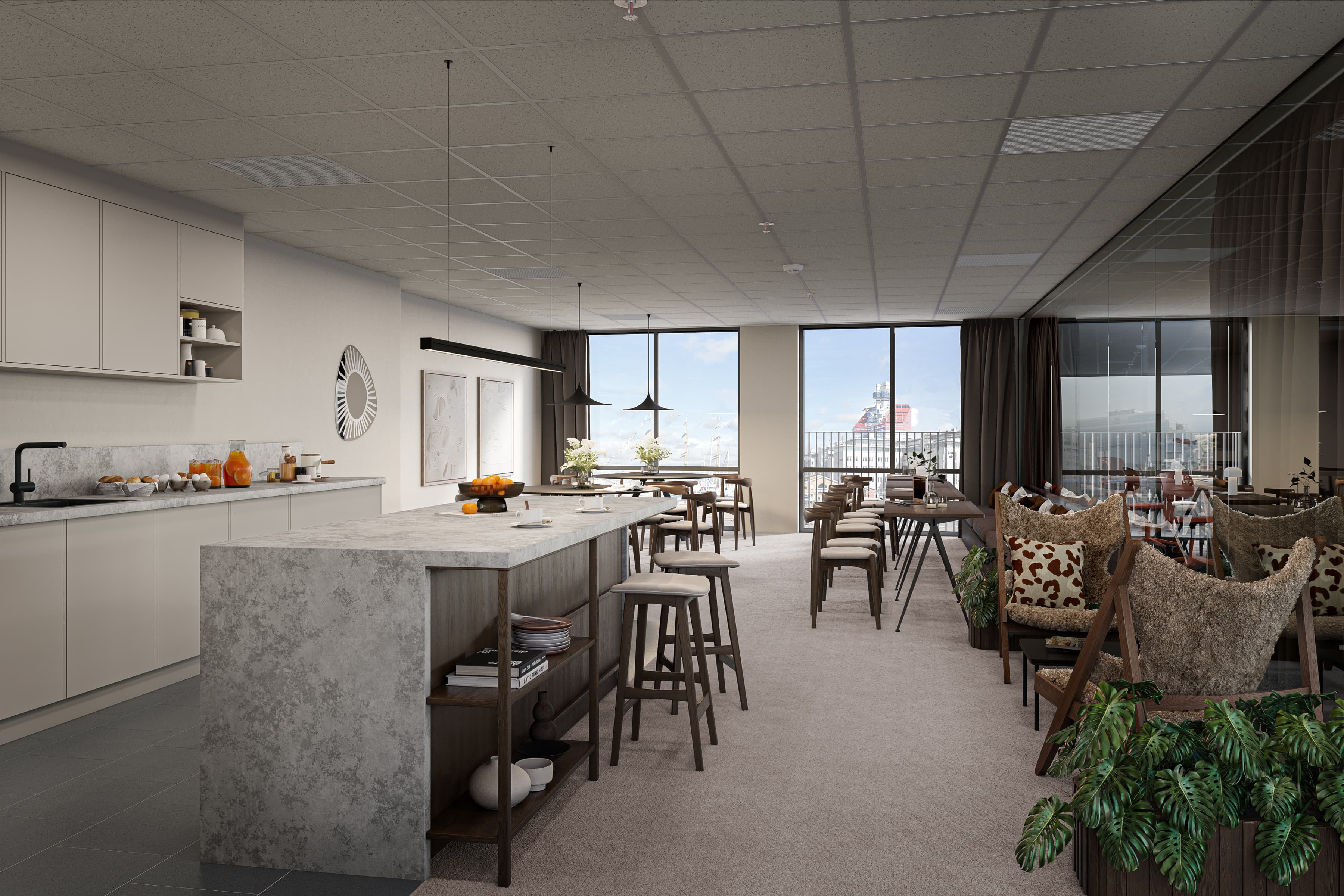 Ett stort öppet kök och matplats med utsikt över staden.