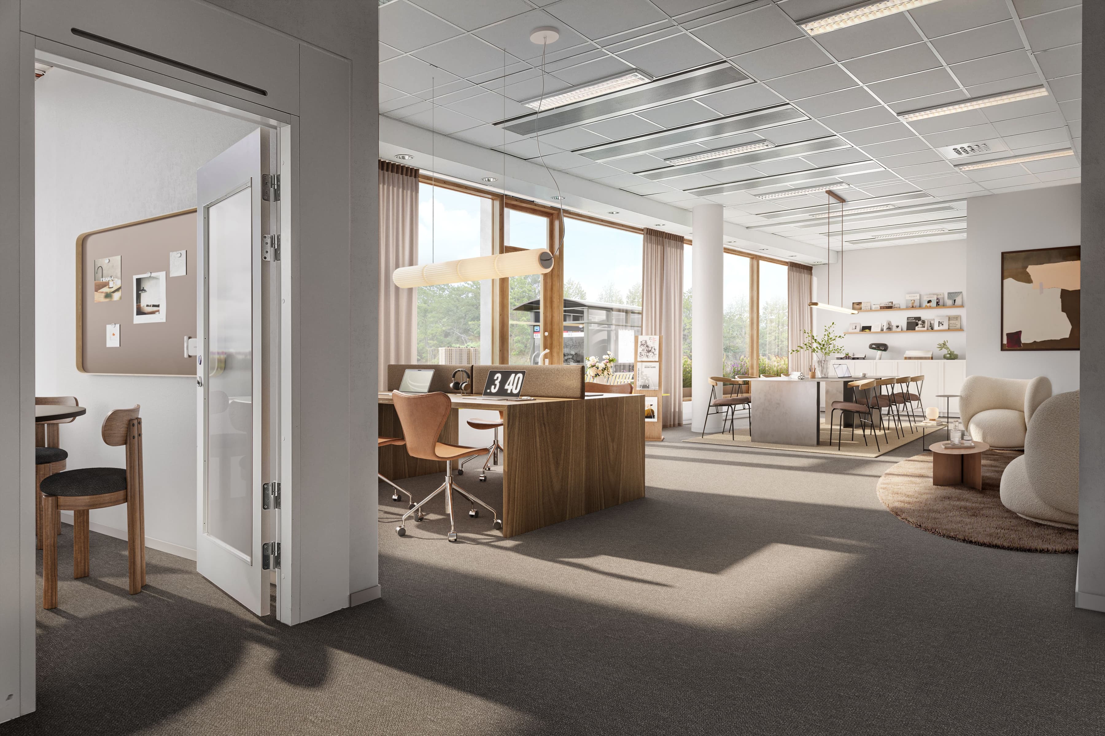 Ett rum med många möbler och ett stort fönster.